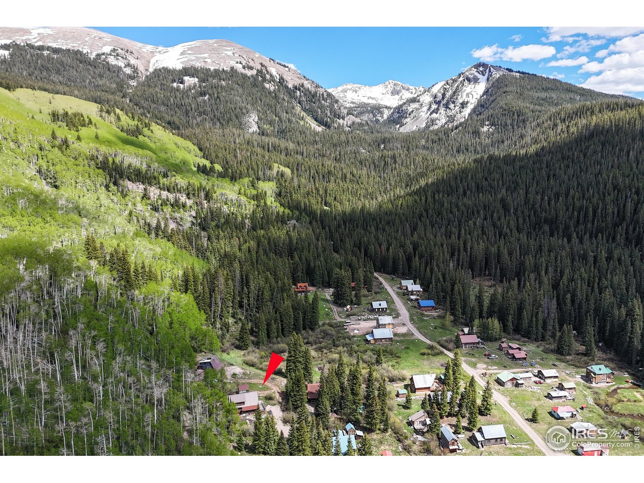 320 Mill Road Eagle, CO 81631 - Photo 24 of 32 a view of a chairs and table in the backyard