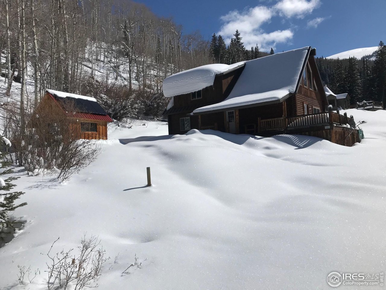 320 Mill Road Eagle, CO 81631 - Photo 29 of 32 a front view of a house with a yard