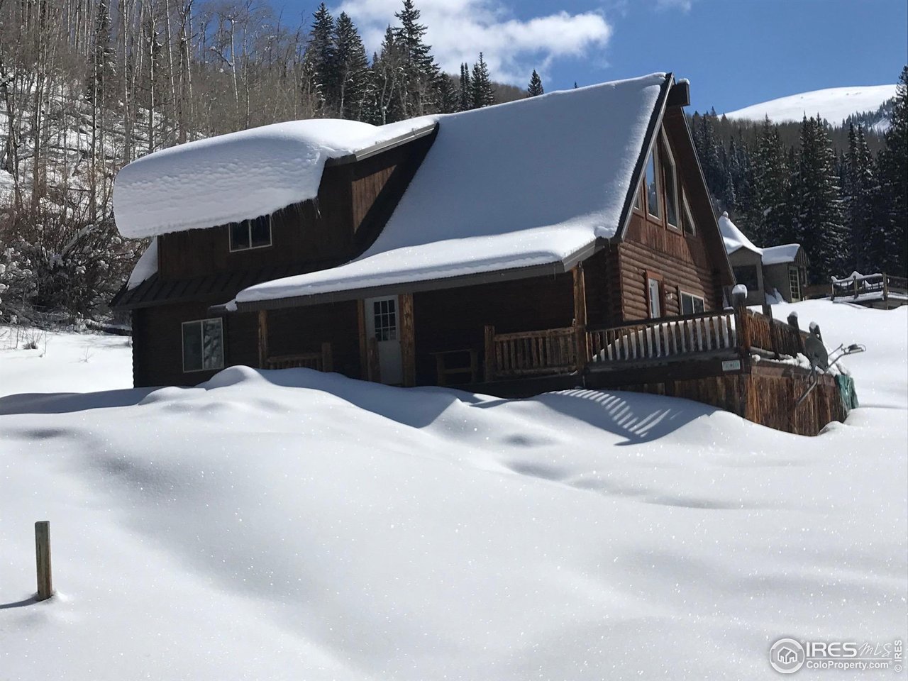 320 Mill Road Eagle, CO 81631 - Photo 30 of 32 a front view of a house with a yard