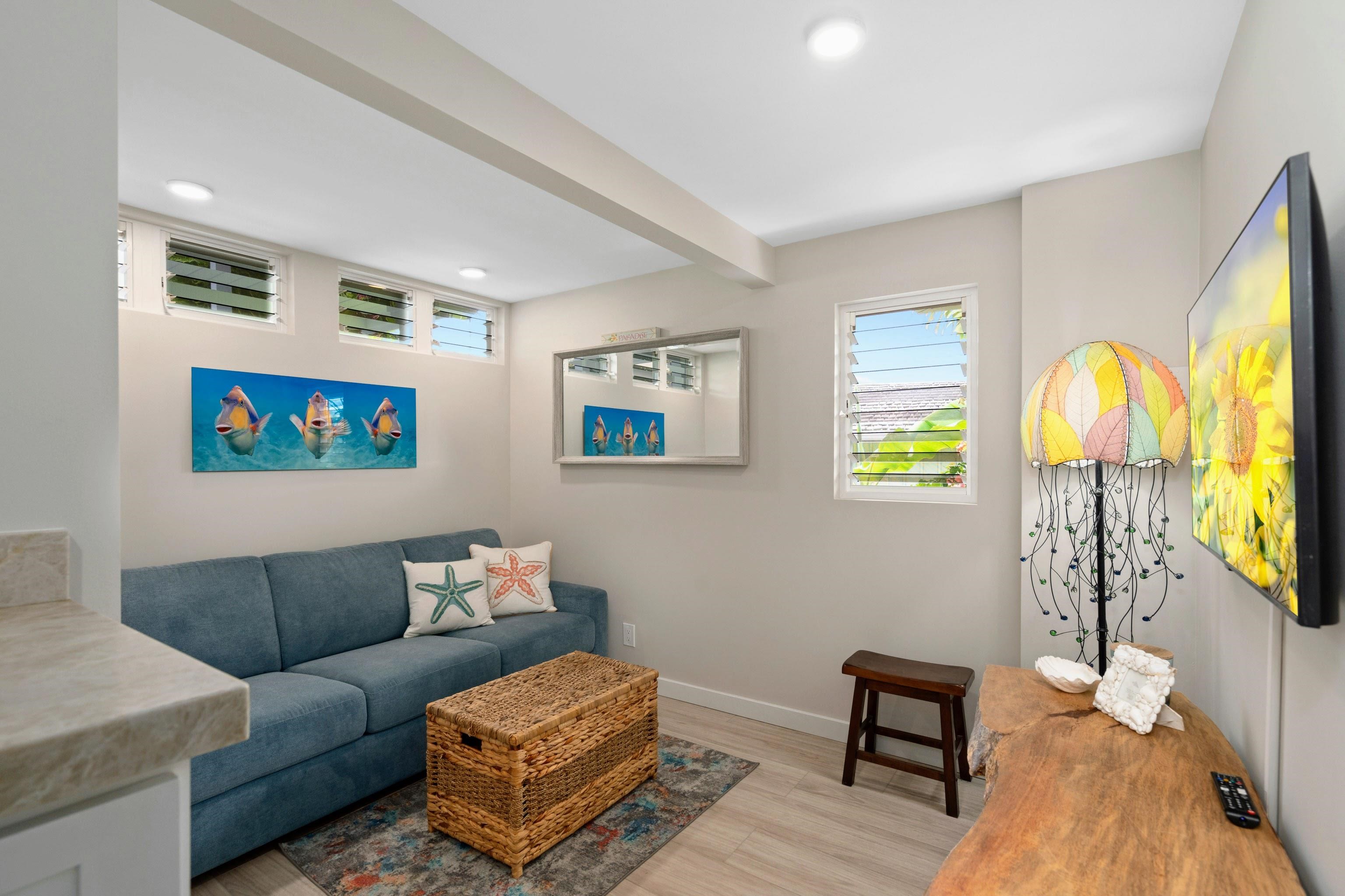 20 Hui Road East, Unit 30 Lahaina, HI 96761 - Photo 11 of 25 a living room with furniture and a flat screen tv