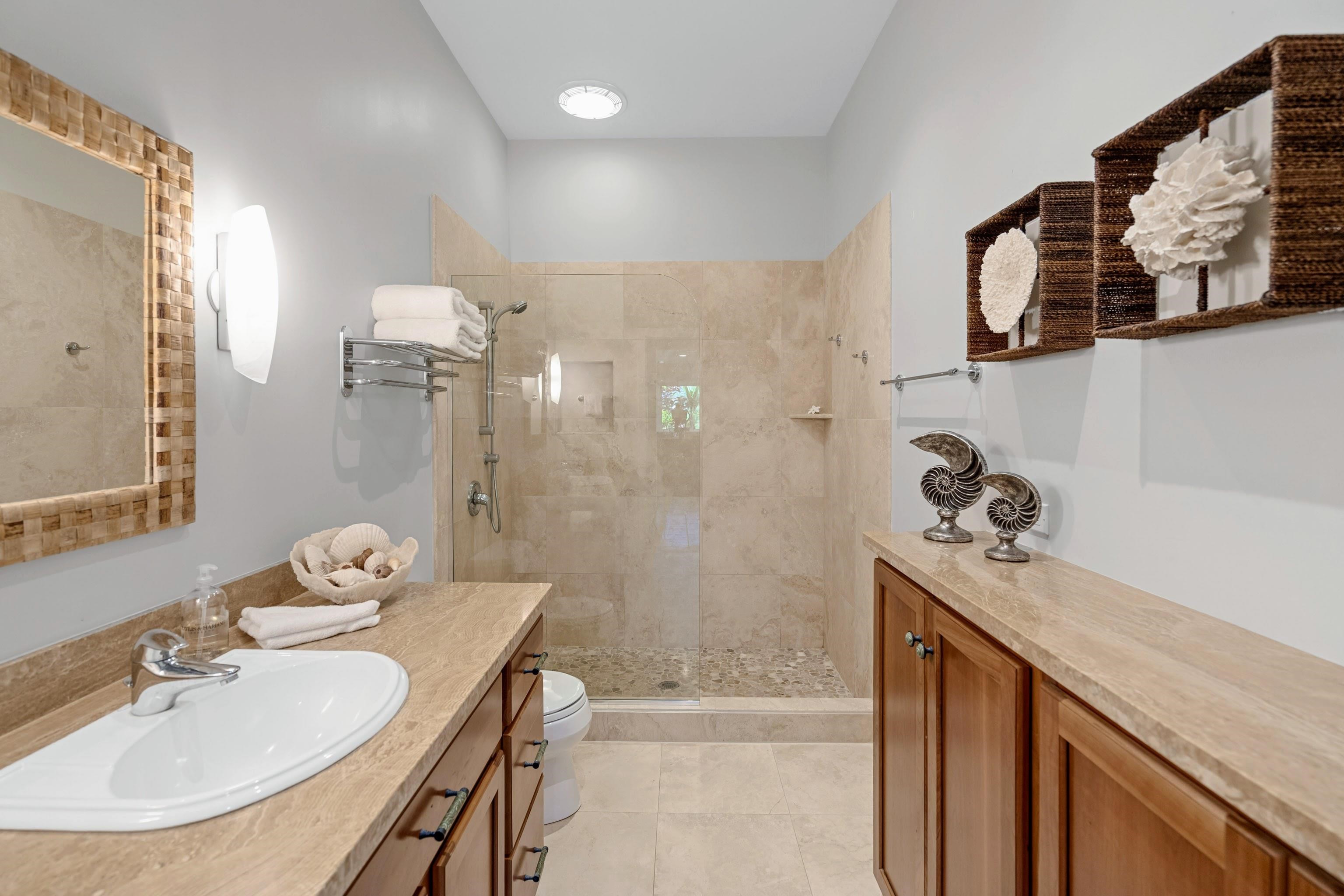 20 Hui Road East, Unit 30 Lahaina, HI 96761 - Photo 13 of 25 a bathroom with a sink and a mirror
