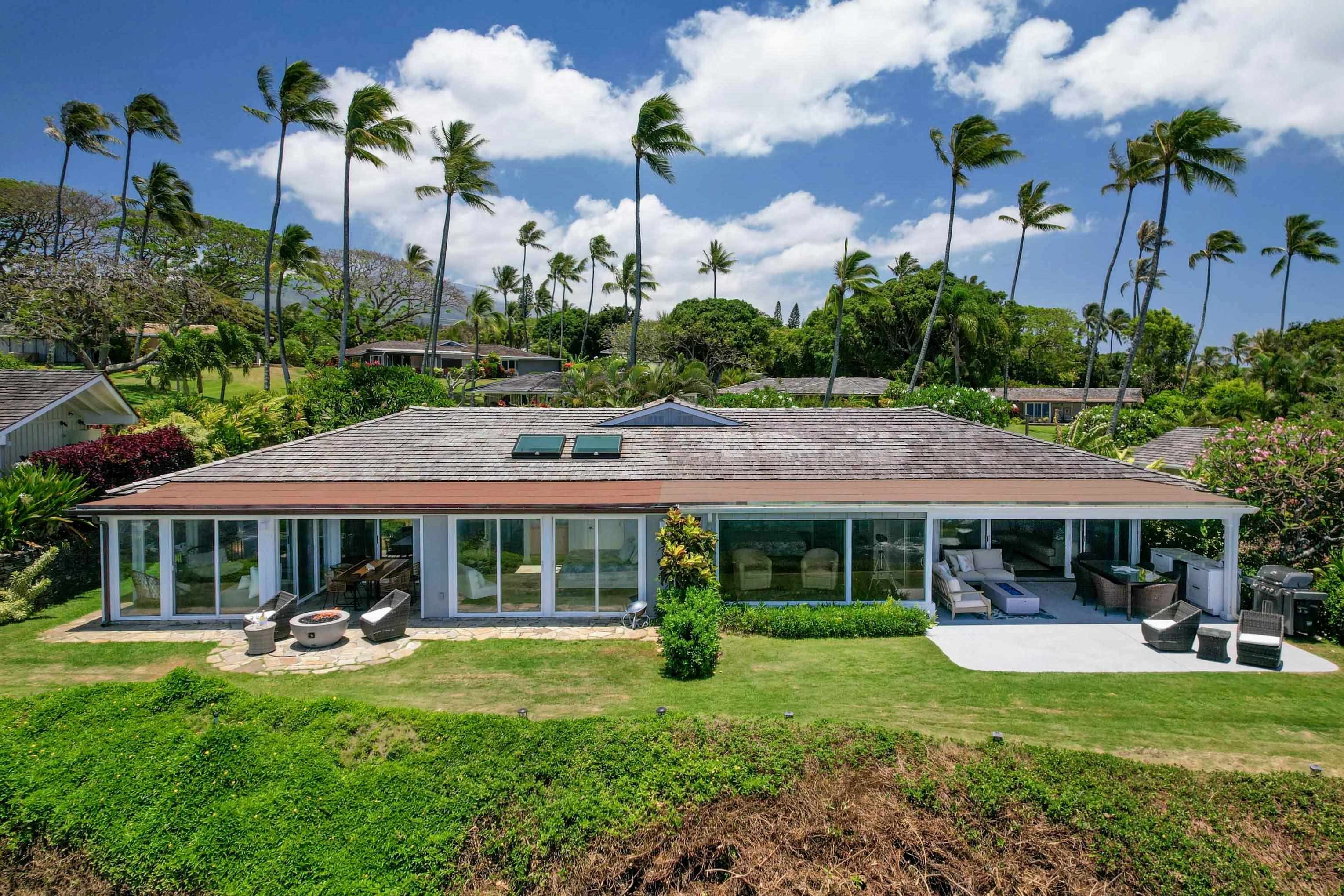 20 Hui Road East, Unit 30 Lahaina, HI 96761 - Photo 22 of 25 a front view of a house with swimming pool having outdoor seating