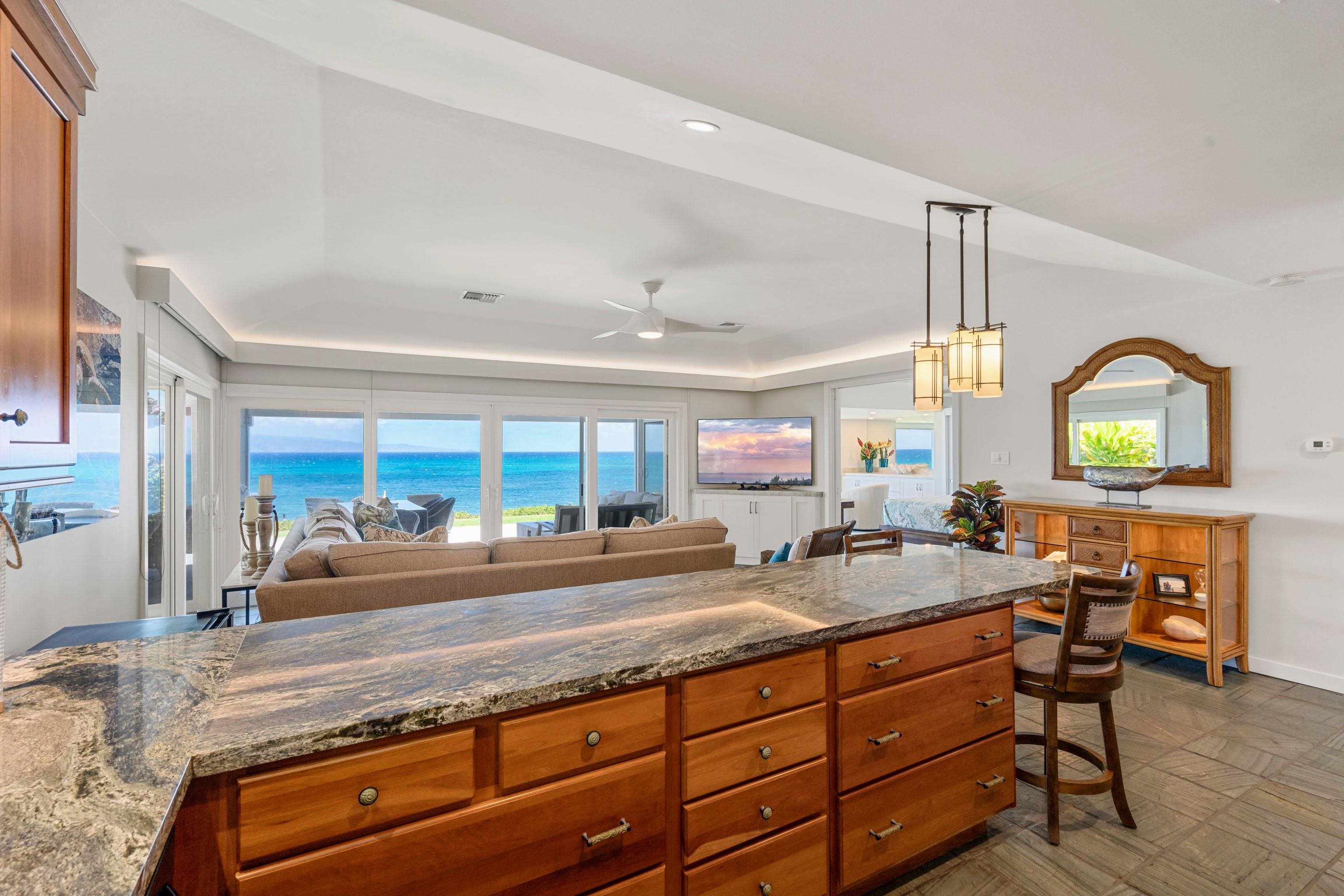20 Hui Road East, Unit 30 Lahaina, HI 96761 - Photo 4 of 25 a living room with granite countertop furniture a couch and large windows