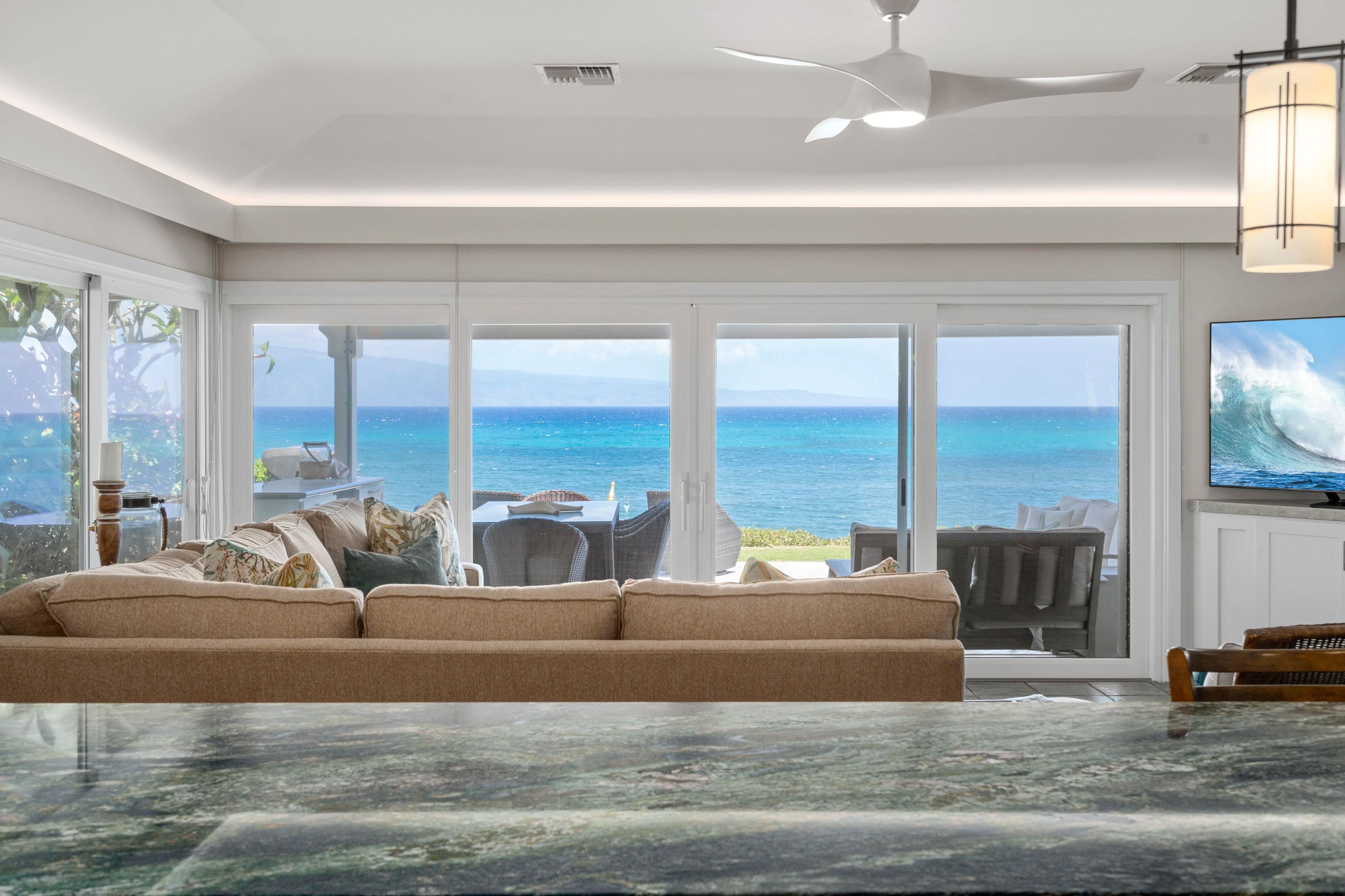 20 Hui Road East, Unit 30 Lahaina, HI 96761 - Photo 5 of 25 a living room with furniture and large windows