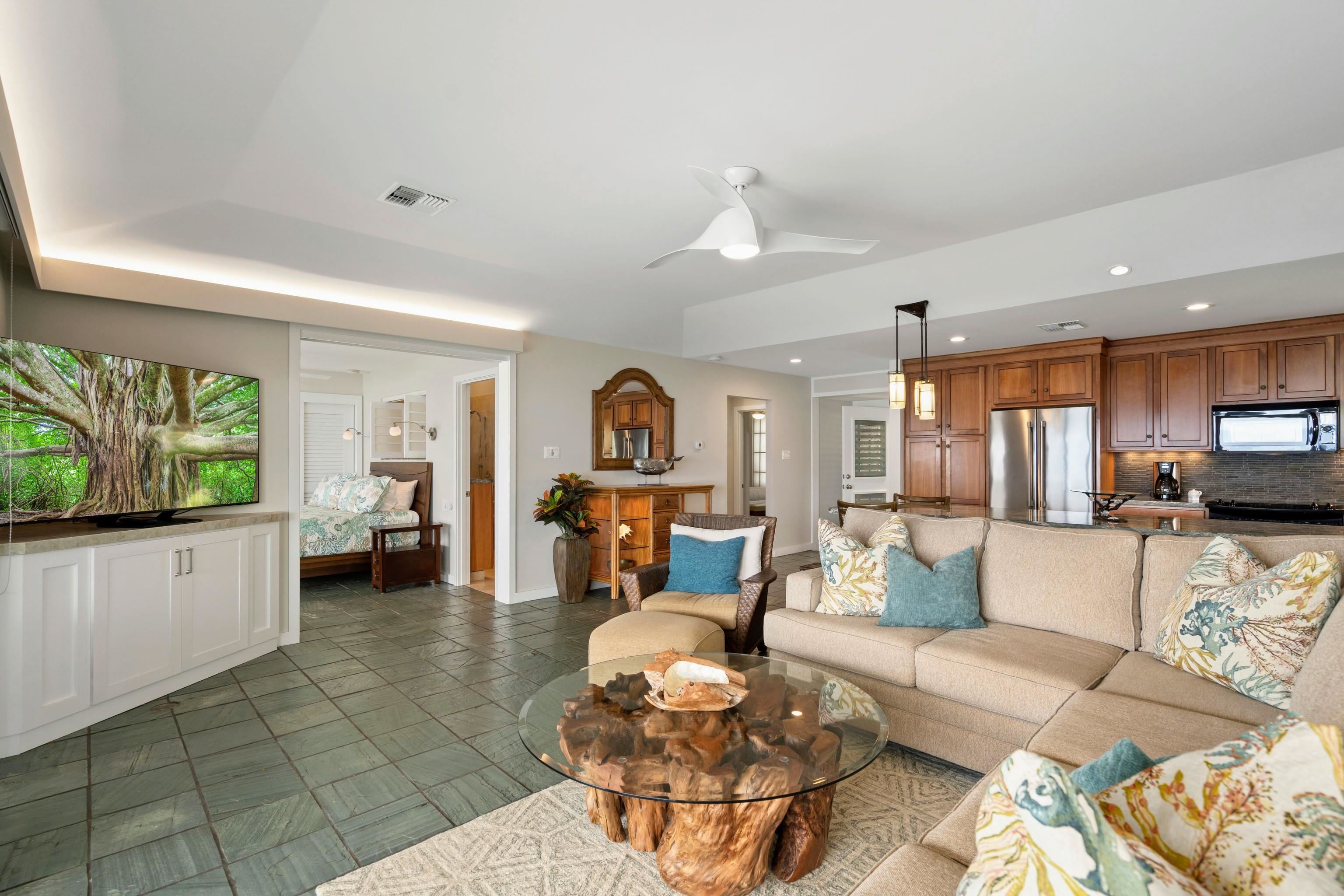20 Hui Road East, Unit 30 Lahaina, HI 96761 - Photo 9 of 25 a living room with furniture and a large window