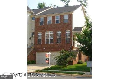 20701 Riptide Square Sterling, VA 20165 - Photo 1 of 1 a front view of a house with garden