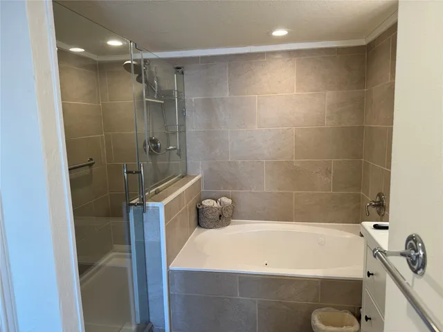 a view of a livingroom with workspace and a window