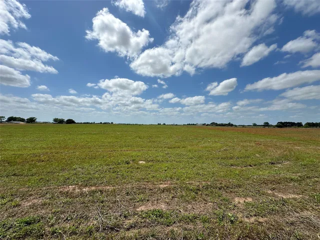 a view of an ocean with beach