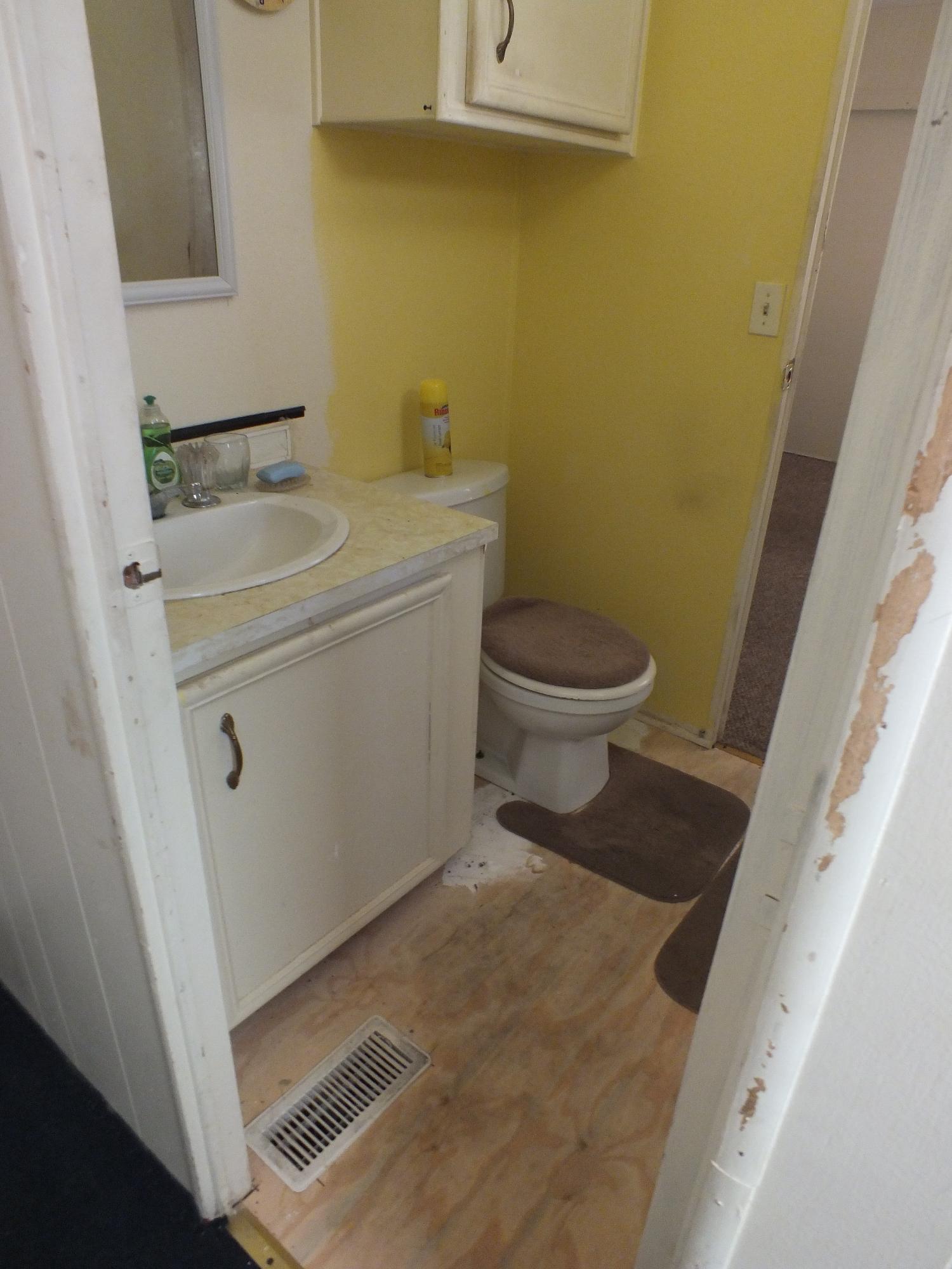 7725 Happy Valley Road, Unit DELUXE Anderson, CA 96007 - Photo 20 of 29 a bathroom with a toilet and a sink