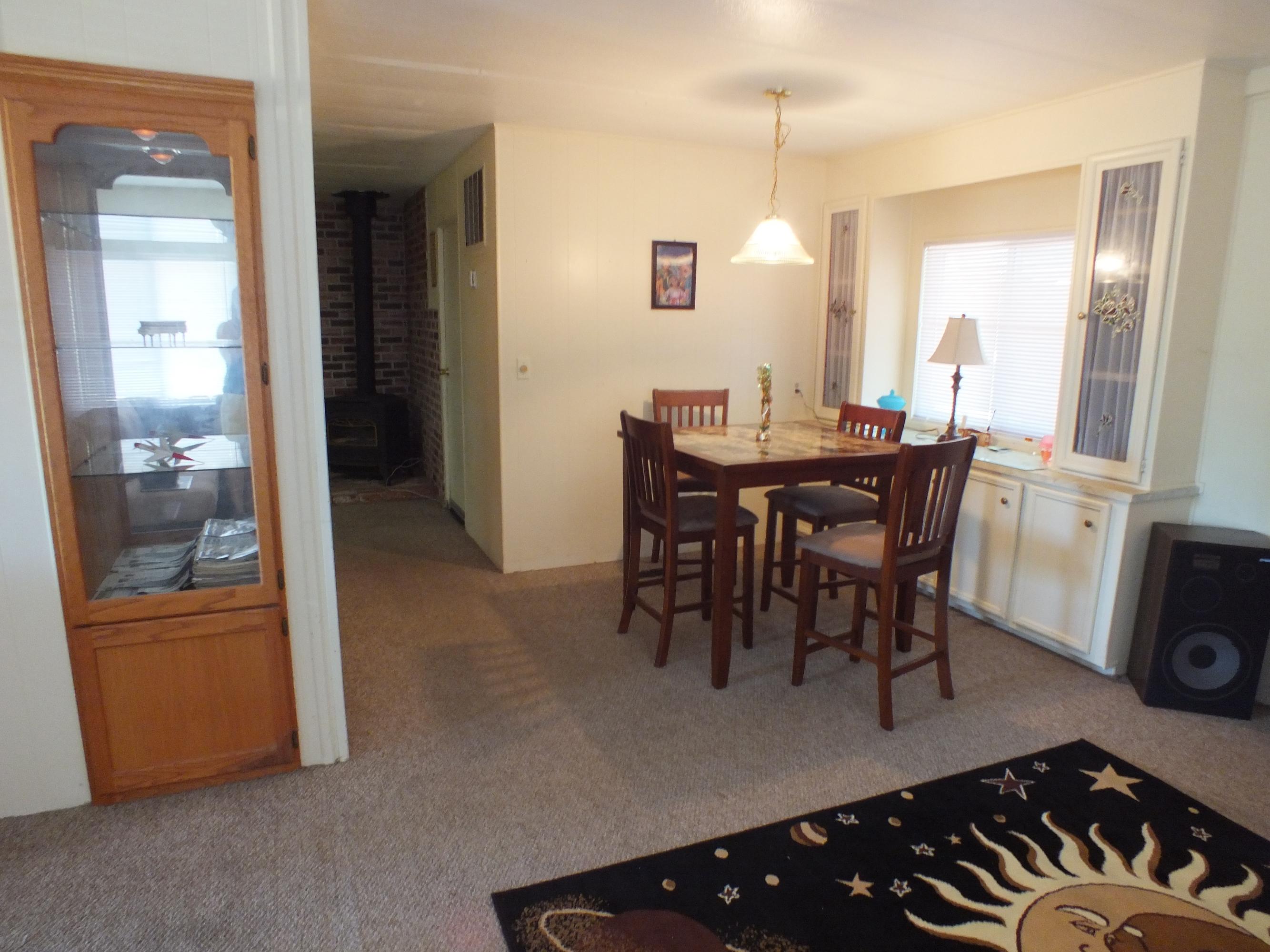7725 Happy Valley Road, Unit DELUXE Anderson, CA 96007 - Photo 27 of 29 a view of a dining room with furniture