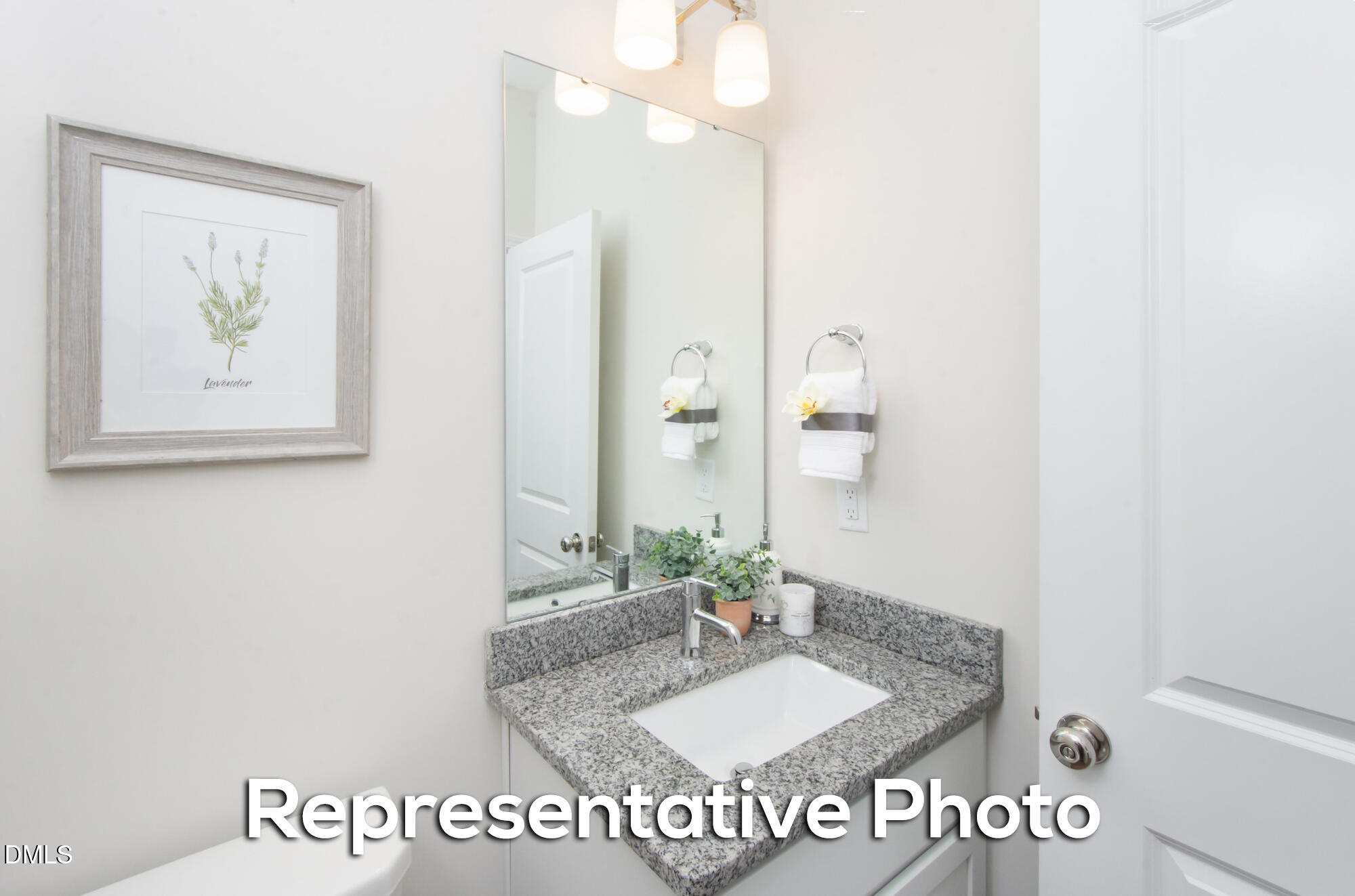 29 H River Meadow Spring Hope, NC 27882 - Photo 12 of 20 a bathroom with a sink and a mirror