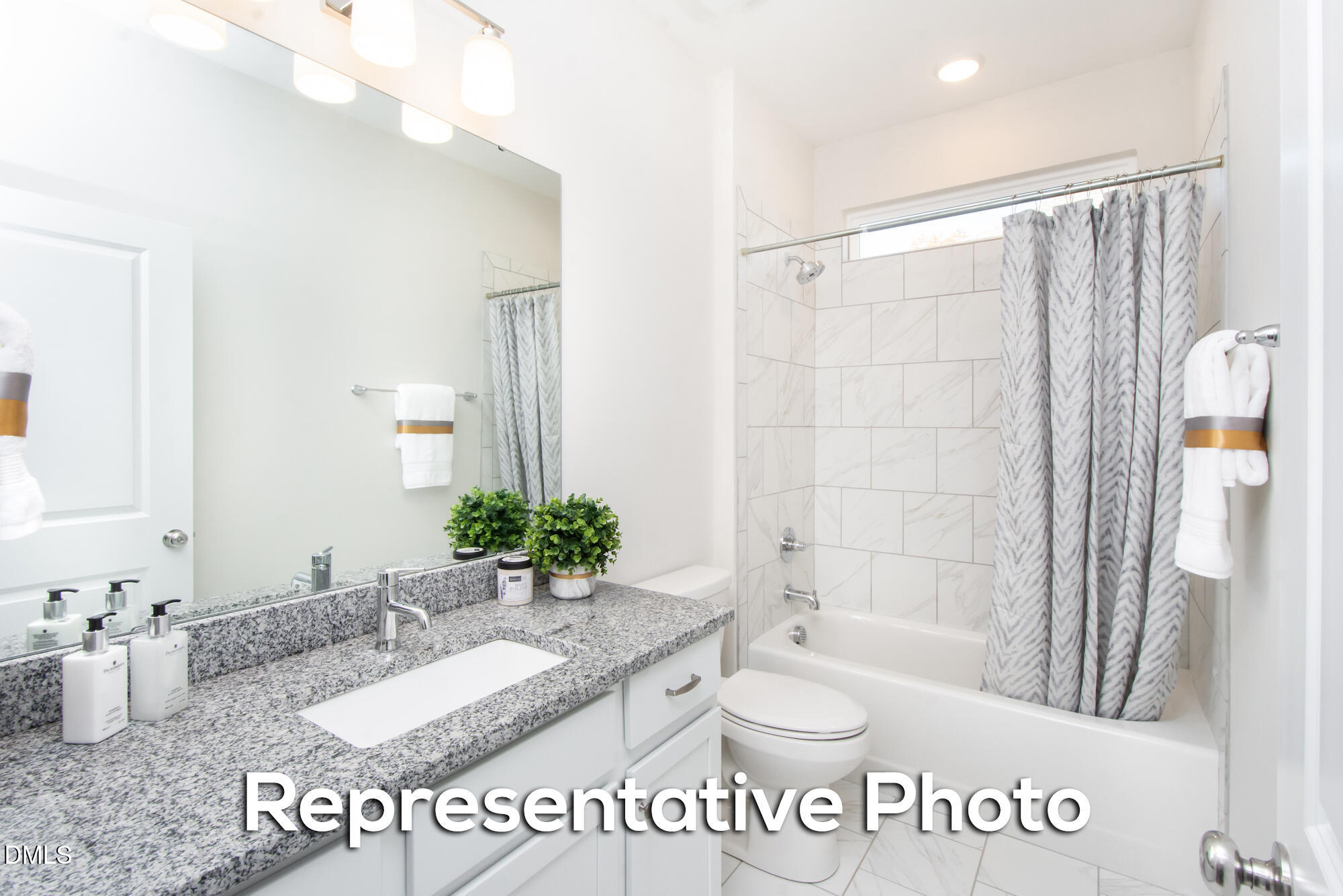 29 H River Meadow Spring Hope, NC 27882 - Photo 13 of 20 a bathroom with a granite countertop sink mirror and a bathtub