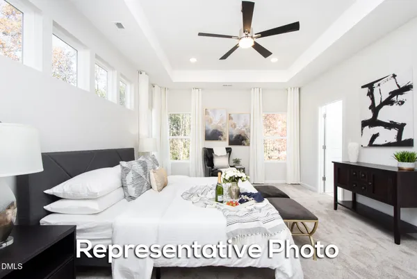 a view of a livingroom with furniture and window