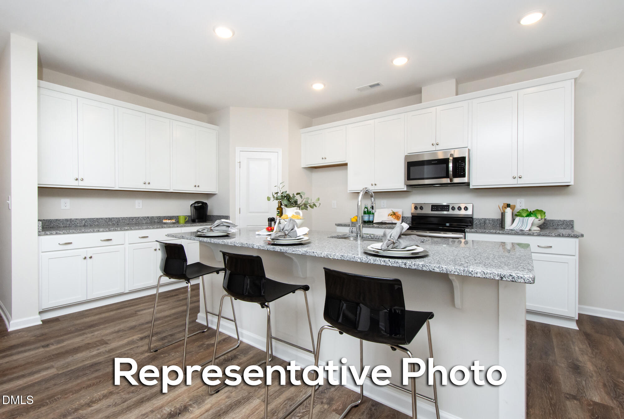 29 H River Meadow Spring Hope, NC 27882 - Photo 4 of 20 a kitchen with a sink cabinets and window
