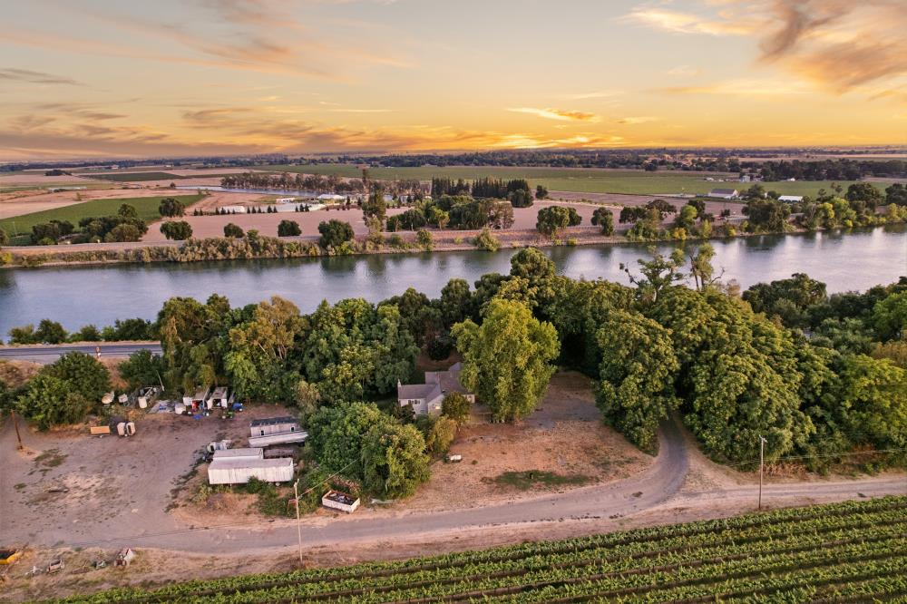 53140 South River Road Clarksburg, CA 95612 - Photo 11 of 66 a view of a lake with a city