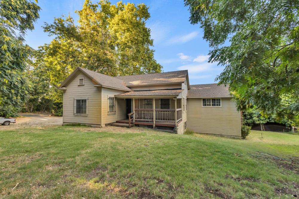53140 South River Road Clarksburg, CA 95612 - Photo 15 of 66 a view of a house with a yard