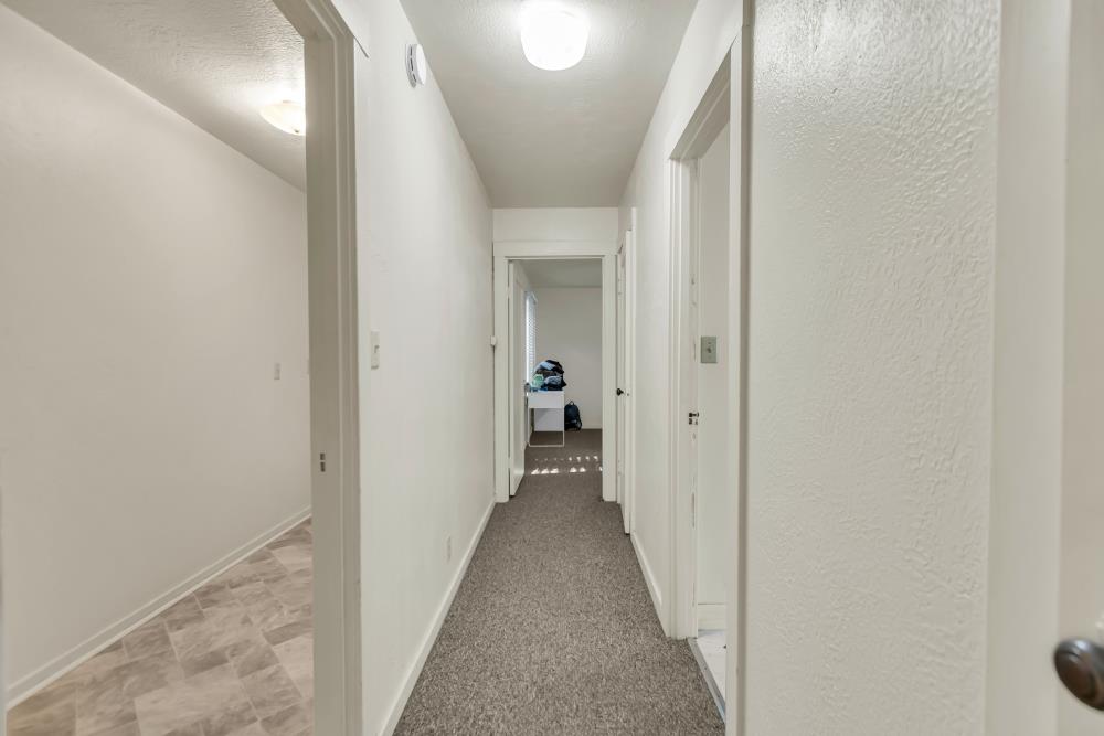 53140 South River Road Clarksburg, CA 95612 - Photo 24 of 66 a view of a hallway with wooden shelves