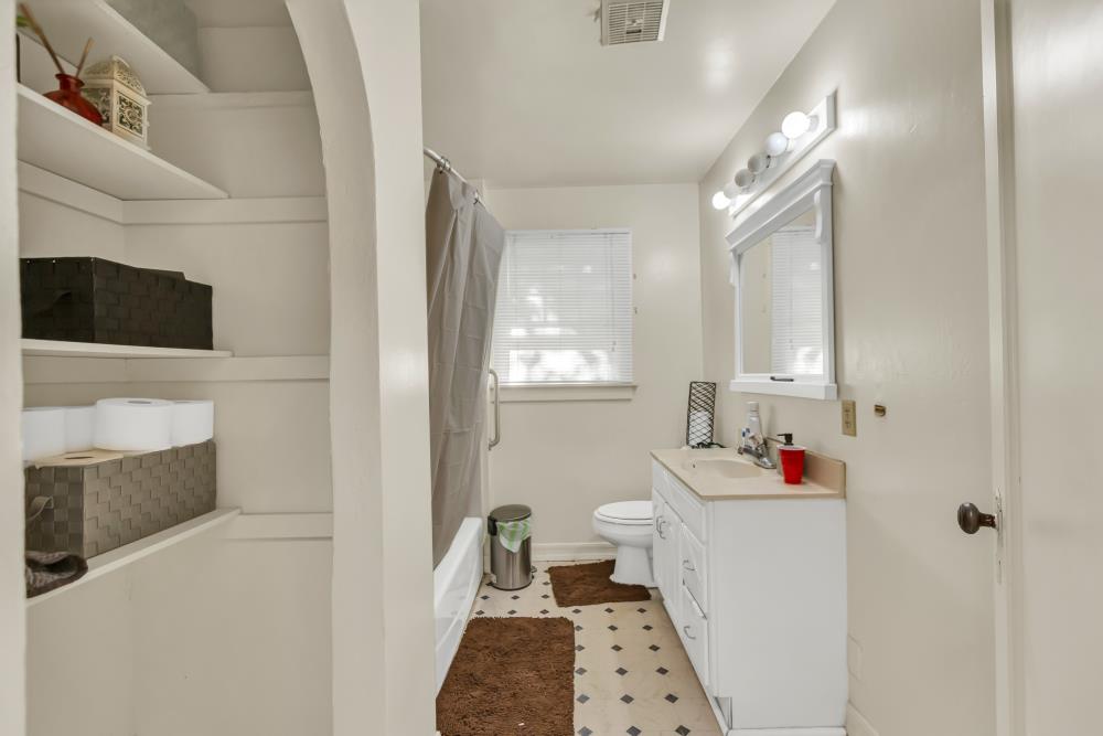 53140 South River Road Clarksburg, CA 95612 - Photo 25 of 66 a bathroom with a sink toilet and shower