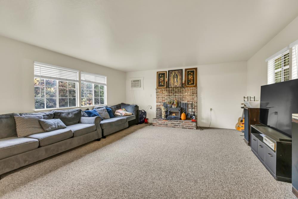53140 South River Road Clarksburg, CA 95612 - Photo 35 of 66 a living room with furniture and a flat screen tv