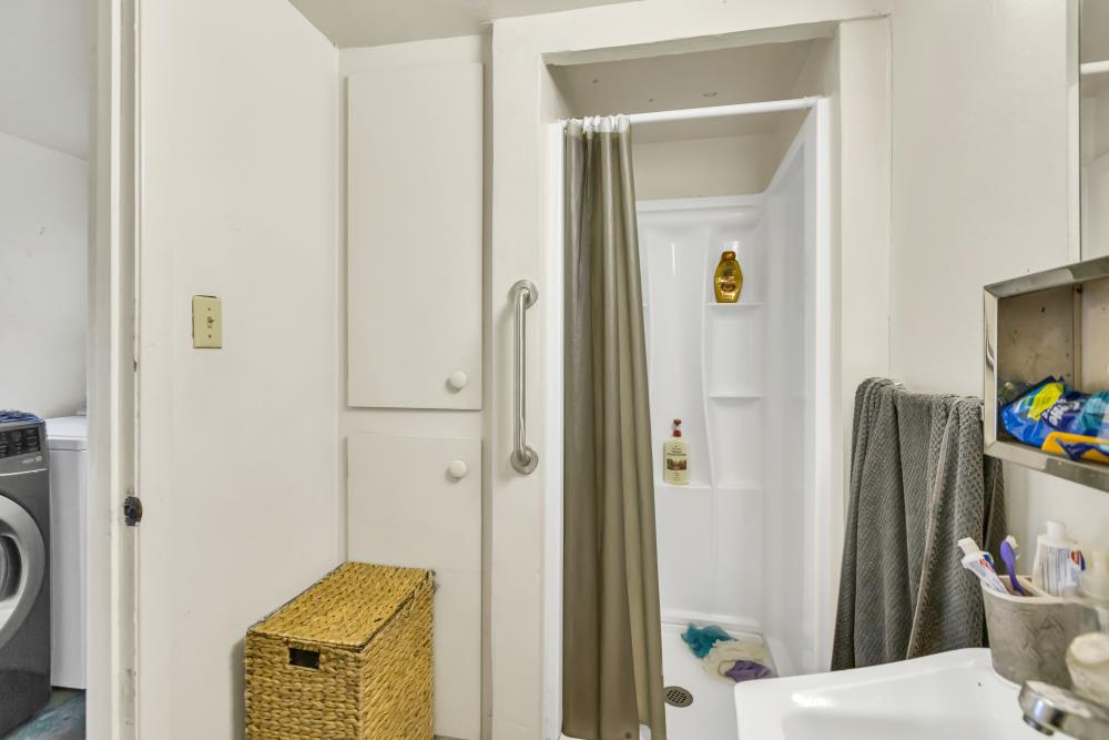 53140 South River Road Clarksburg, CA 95612 - Photo 41 of 66 a bathroom with a sink and a mirror