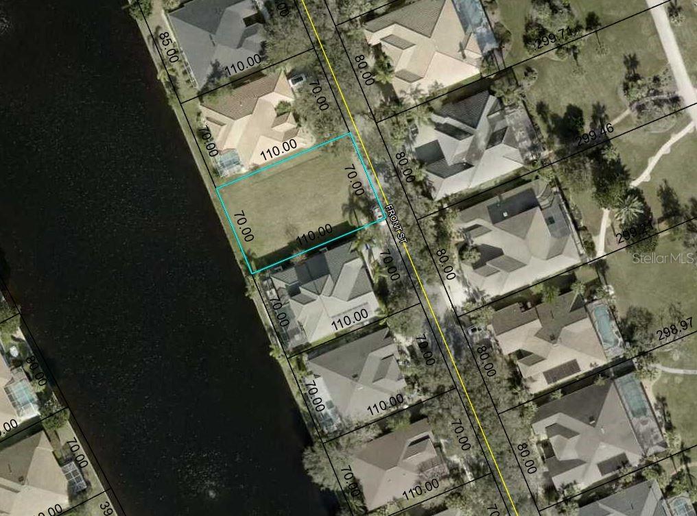 86 Front Street Palm Coast, FL 32137 - Photo 1 of 2 an aerial view of a house with a yard
