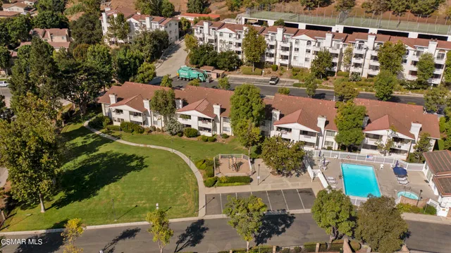 an aerial view of a houses with outdoor space