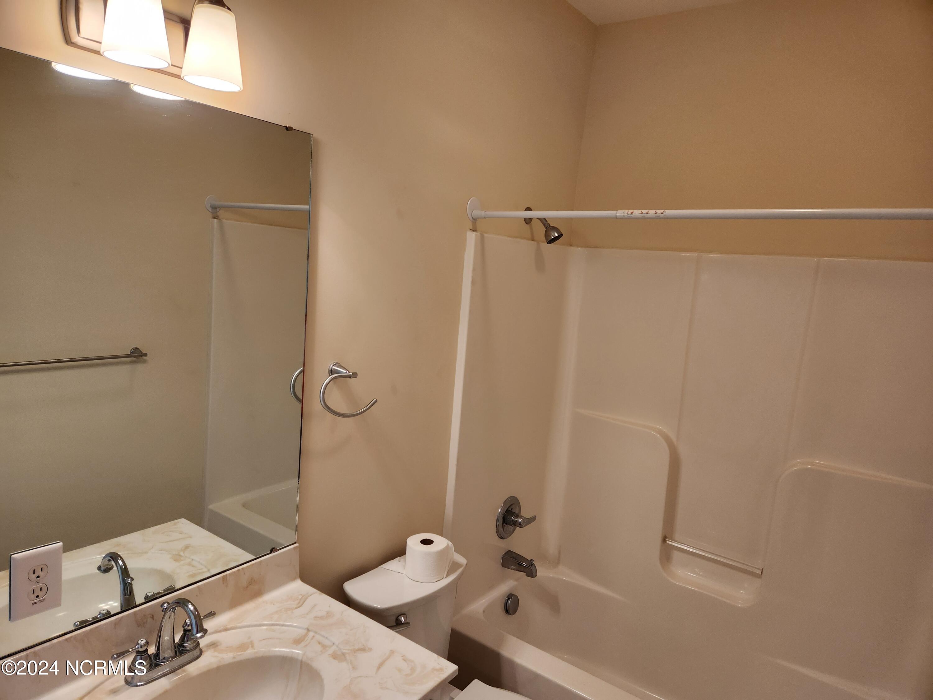 1129 Bennett Road, Unit 1A Minnesott Beach, NC 28510 - Photo 14 of 35 The Jack & Jill bathroom is a really nice size.
