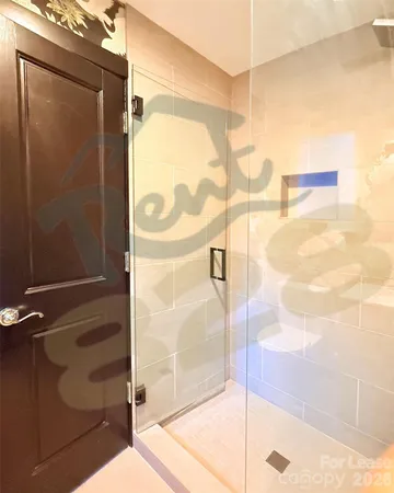 a bathroom with a sink mirror vanity and toilet