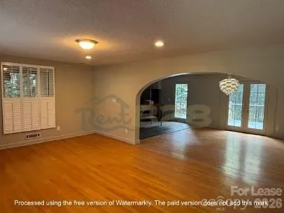 an empty room with windows