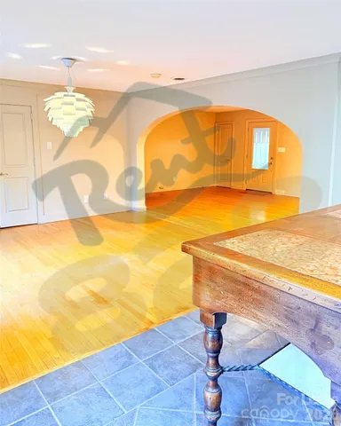 a view of swimming pool with seating space