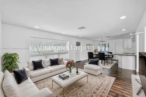 a sign that is on the wall of the building