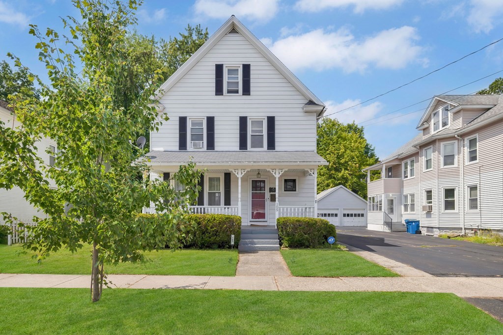 105 Pine Street West Springfield, MA 01089 - Photo 1 of 35 a front view of a house with a yard