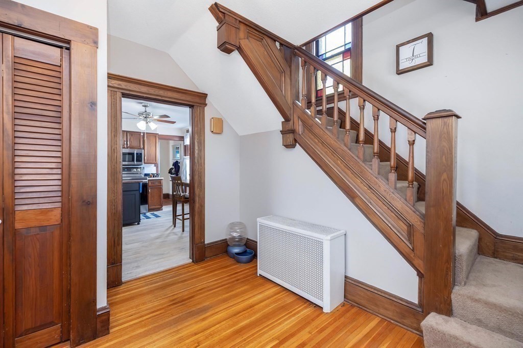 105 Pine Street West Springfield, MA 01089 - Photo 14 of 35 a view of entryway and hall with wooden floor