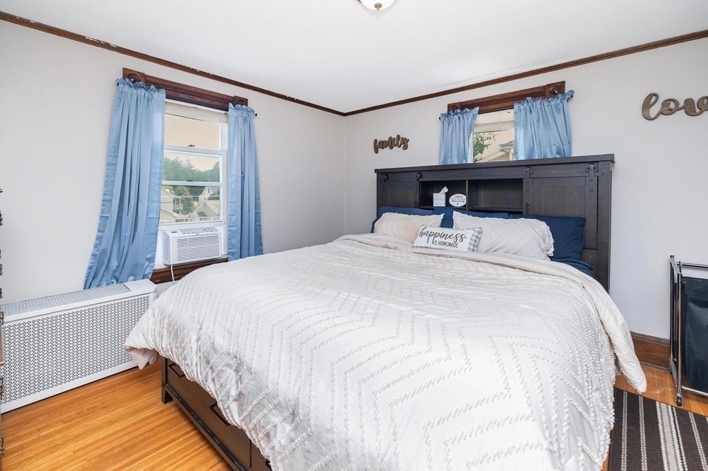 105 Pine Street West Springfield, MA 01089 - Photo 18 of 35 a bedroom with a bed and a window