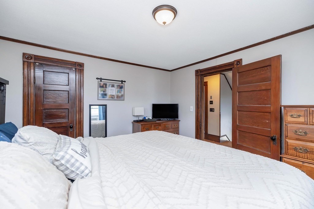 105 Pine Street West Springfield, MA 01089 - Photo 19 of 35 a bedroom with a bed and a closet