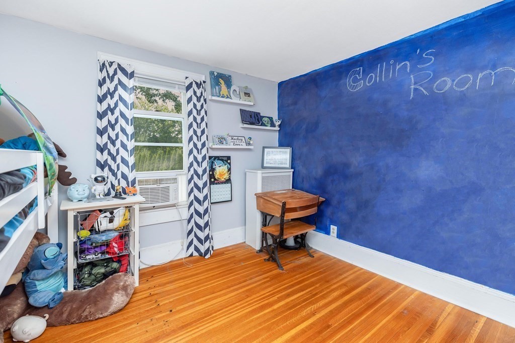 105 Pine Street West Springfield, MA 01089 - Photo 22 of 35 a room with furniture and a book shelf