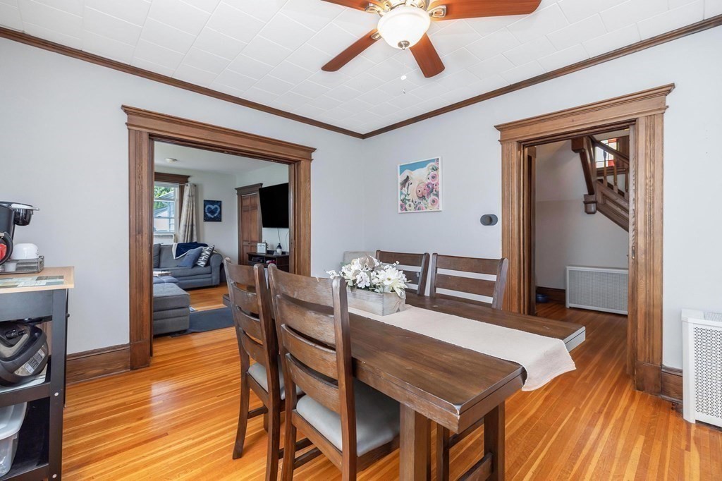 105 Pine Street West Springfield, MA 01089 - Photo 8 of 35 a view of a dining room with furniture and wooden floor