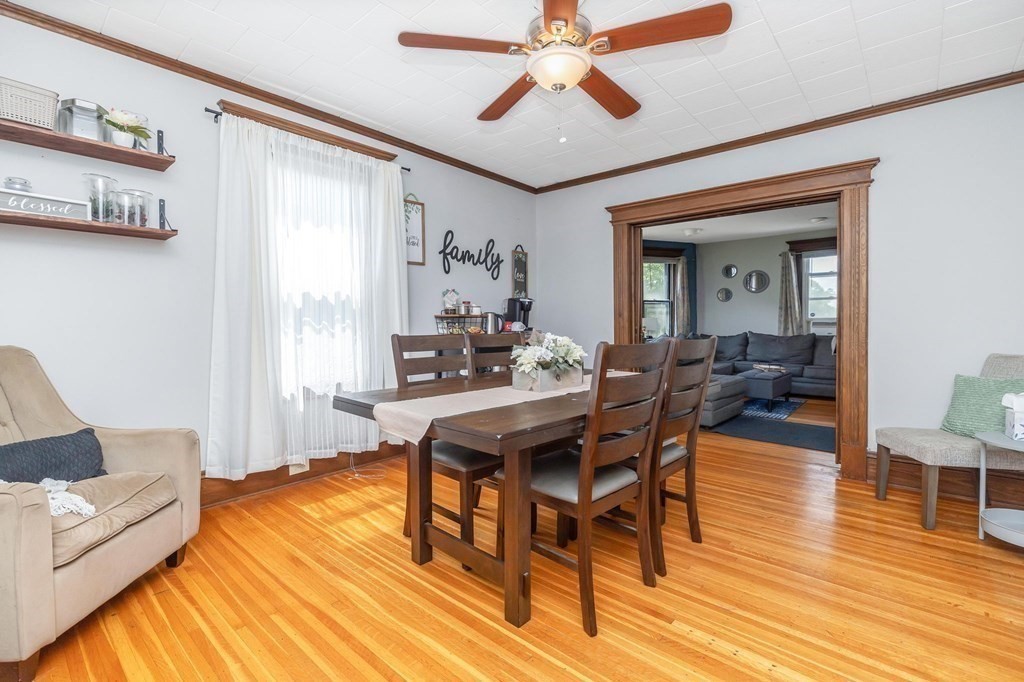 105 Pine Street West Springfield, MA 01089 - Photo 9 of 35 a view of a dining room with furniture and wooden floor
