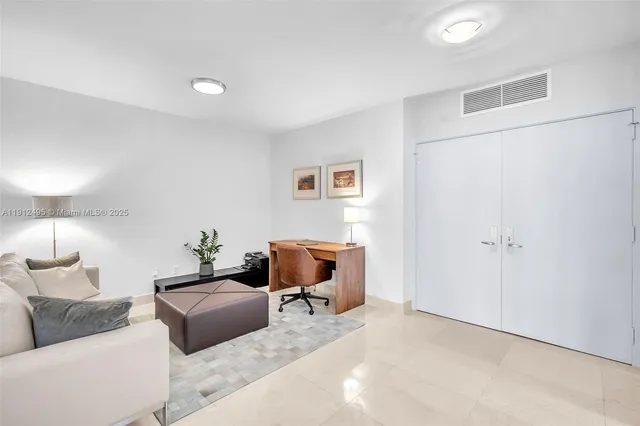 a bedroom with furniture and a bed