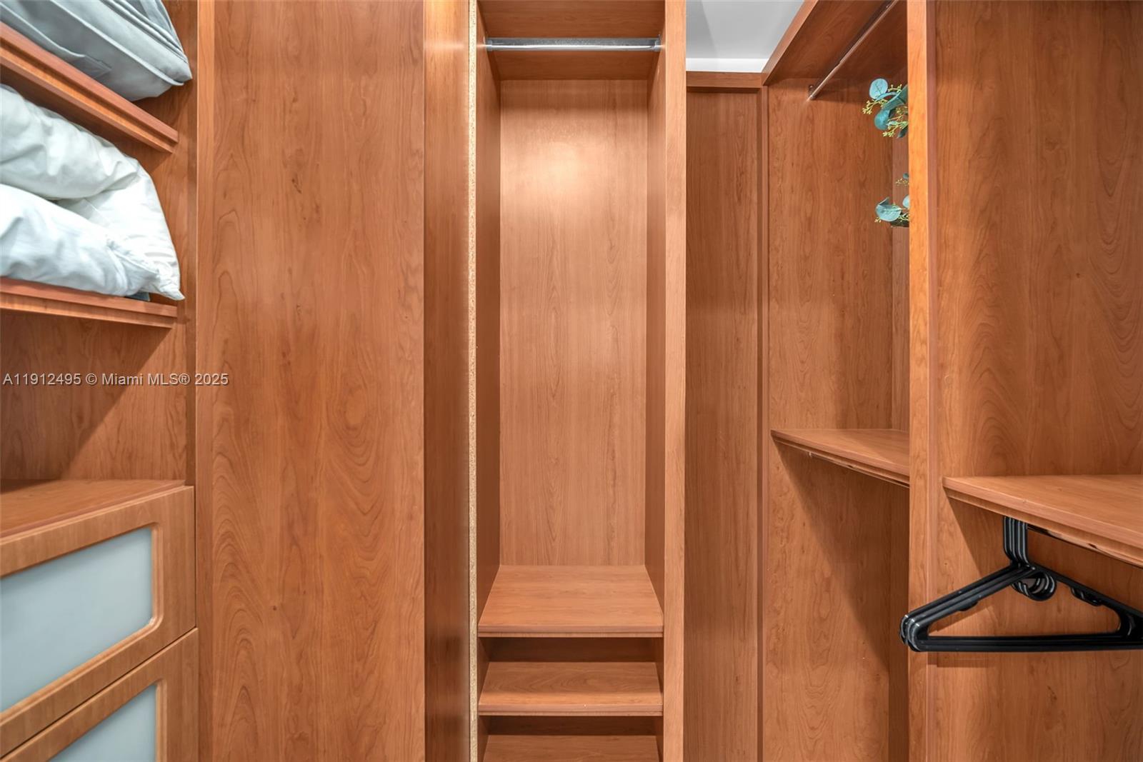 1331 Brickell Bay Drive, Unit 3609 Miami, FL 33131 - Photo 24 of 35 a view of walk in closet