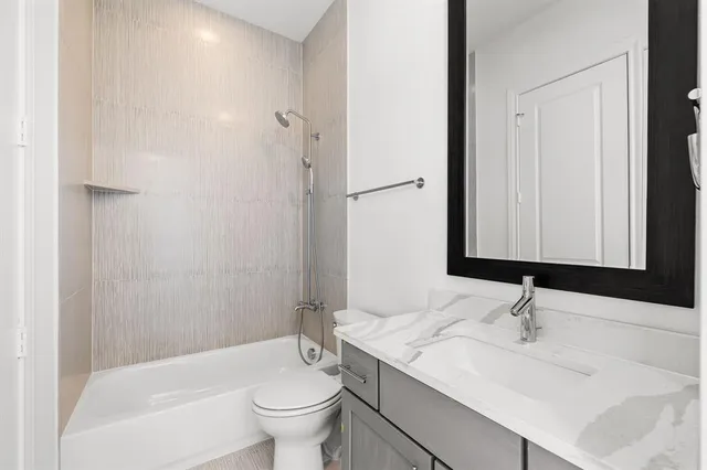 a front view of a building with a street