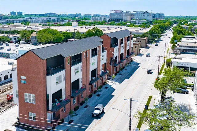 a kitchen with a sink cabinets and stainless steel appliances