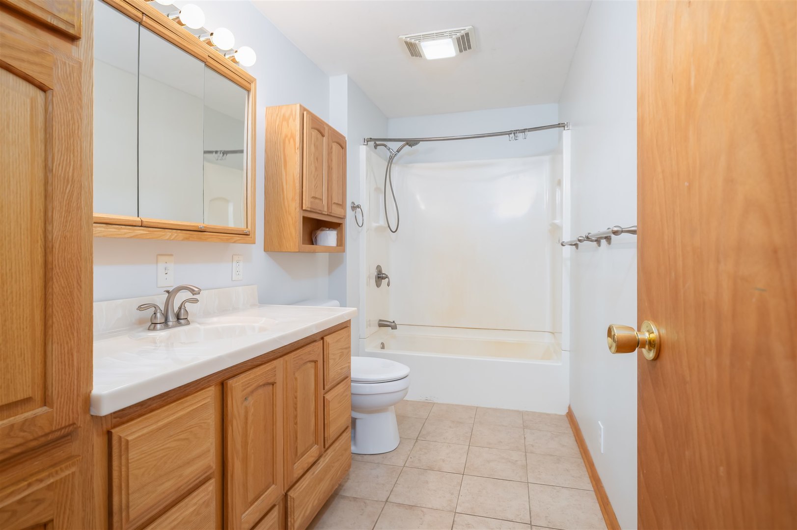 19097 1330 E Road Pontiac, IL 61764 - Photo 12 of 48 a bathroom with a granite countertop sink toilet and shower