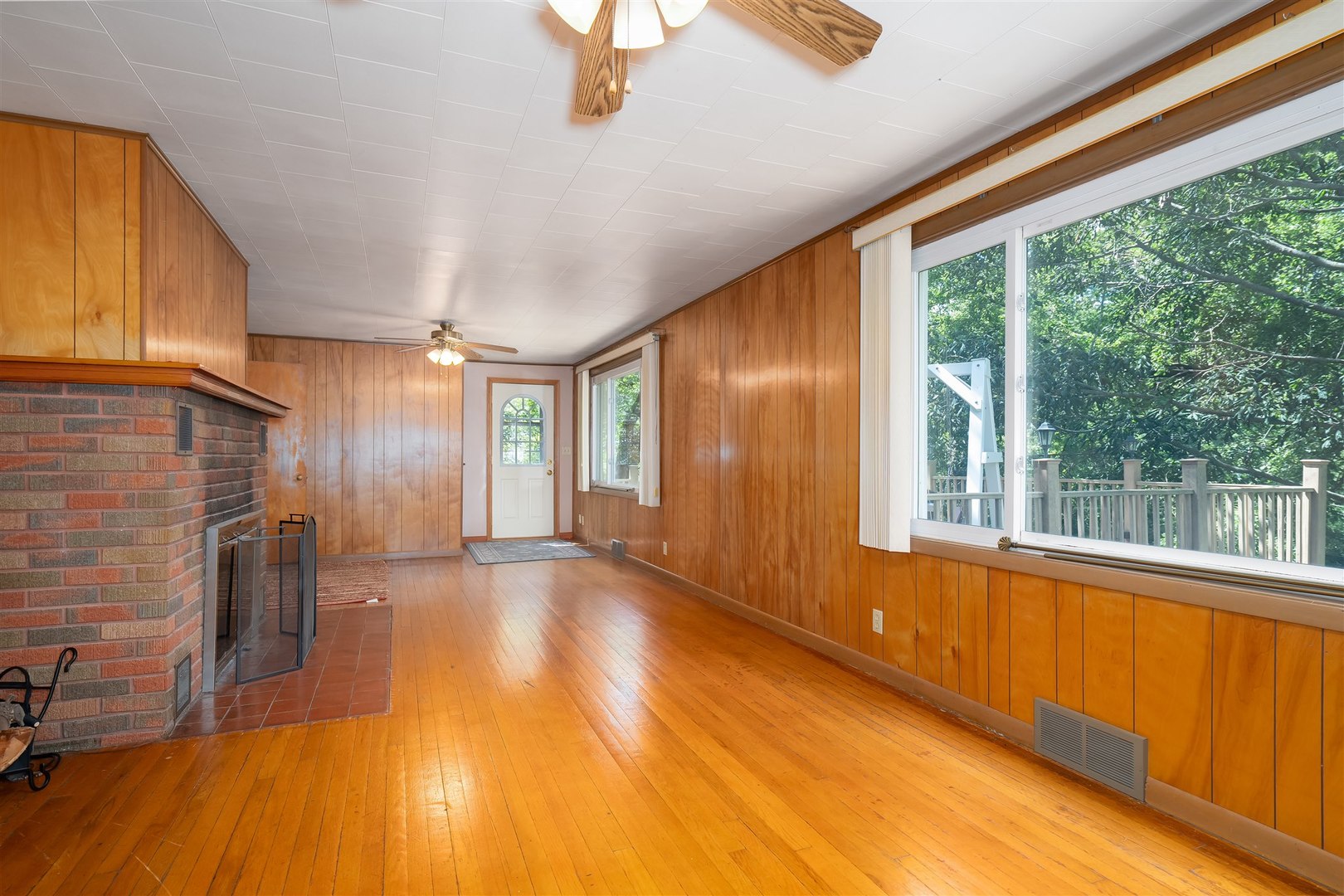 19097 1330 E Road Pontiac, IL 61764 - Photo 17 of 48 a view of empty room with wooden floor and fan