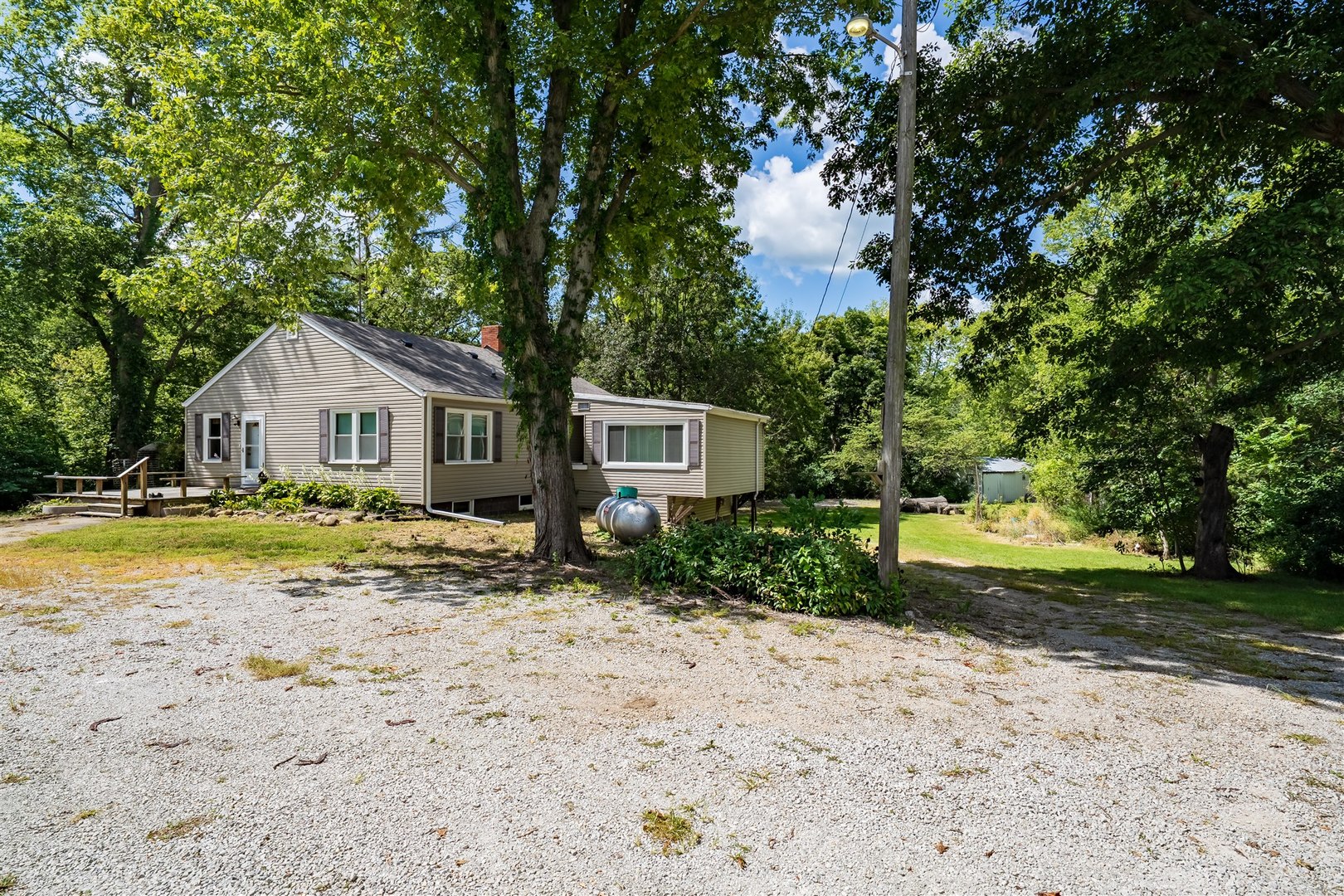 19097 1330 E Road Pontiac, IL 61764 - Photo 26 of 48 a front view of a house with a yard and garage