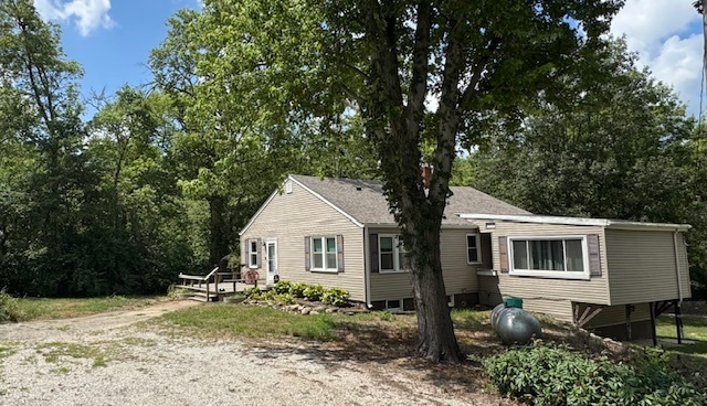 19097 1330 E Road Pontiac, IL 61764 - Photo 3 of 48 a front view of a house with a yard