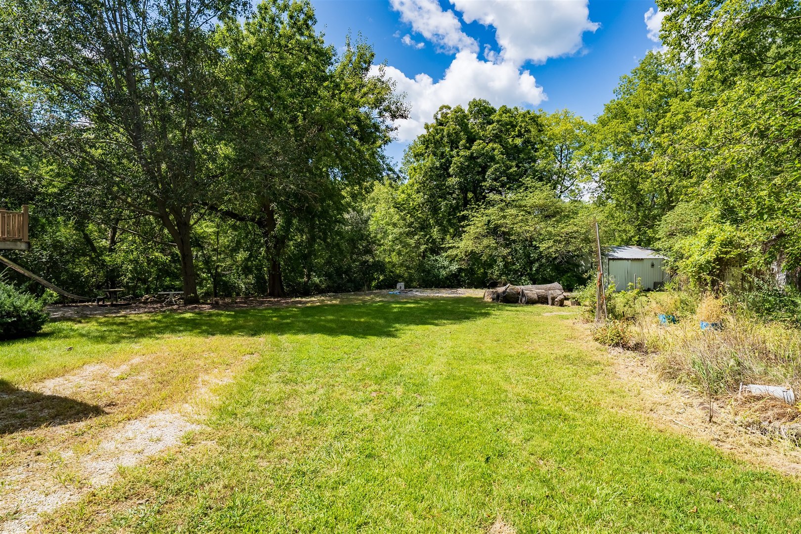 19097 1330 E Road Pontiac, IL 61764 - Photo 31 of 48 a view of a swimming pool with an outdoor space