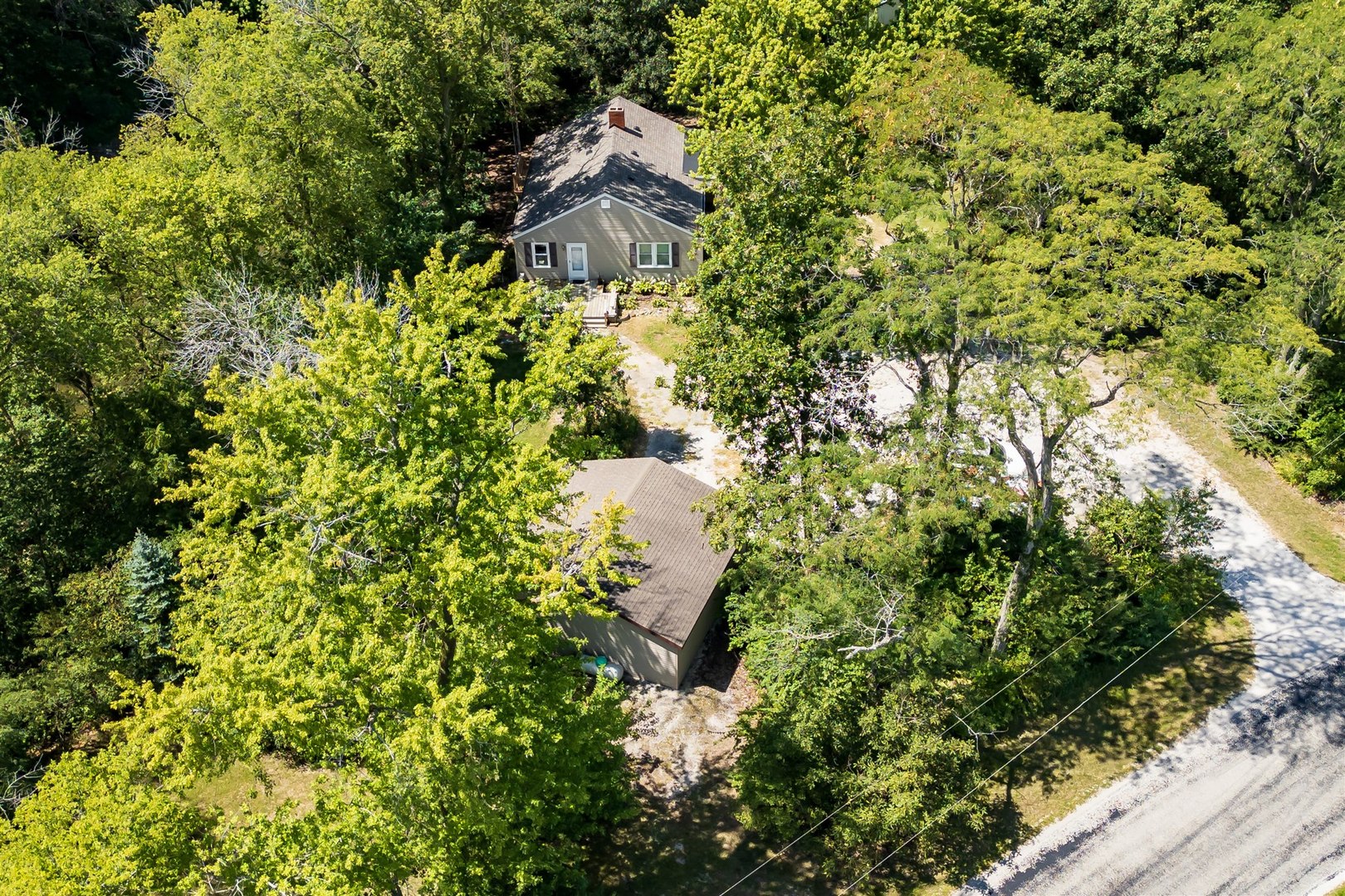 19097 1330 E Road Pontiac, IL 61764 - Photo 39 of 48 a aerial view of a house with a yard and lake view