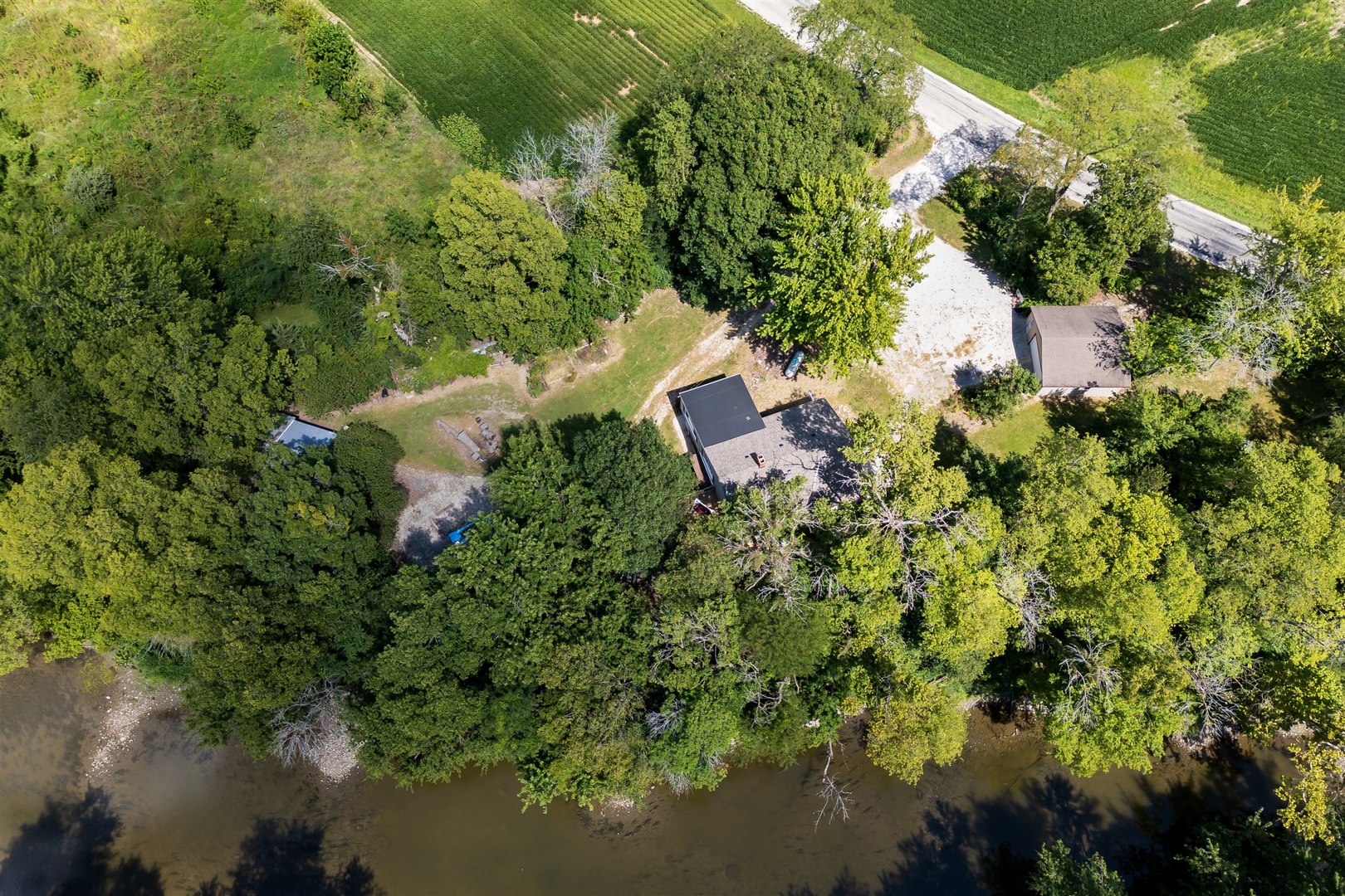19097 1330 E Road Pontiac, IL 61764 - Photo 48 of 48 a aerial view of a house with a yard and lake view