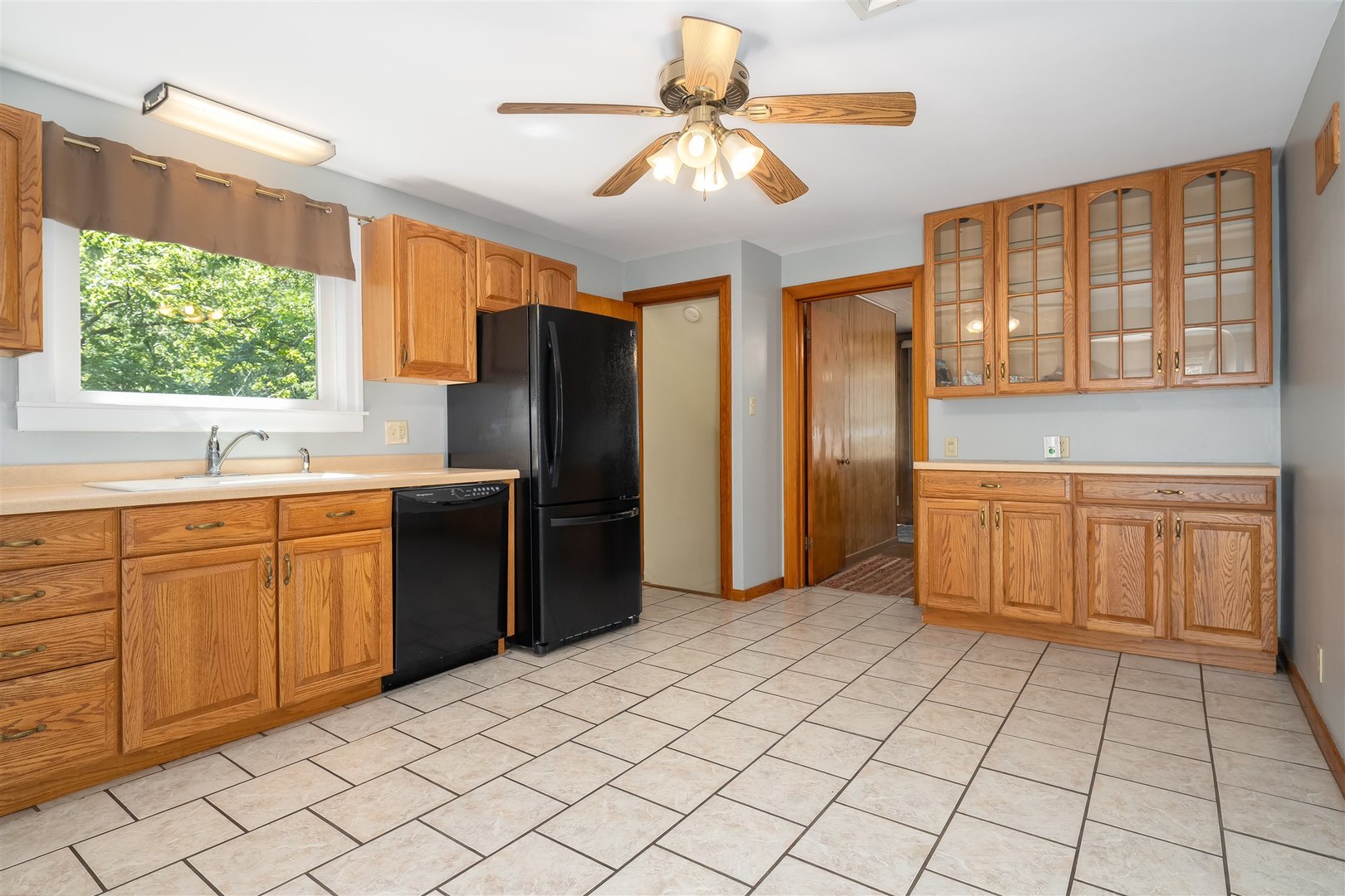 19097 1330 E Road Pontiac, IL 61764 - Photo 6 of 48 a kitchen with stainless steel appliances granite countertop a refrigerator and a sink